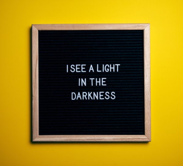 I see a light in the darkness lettering inspirational quote